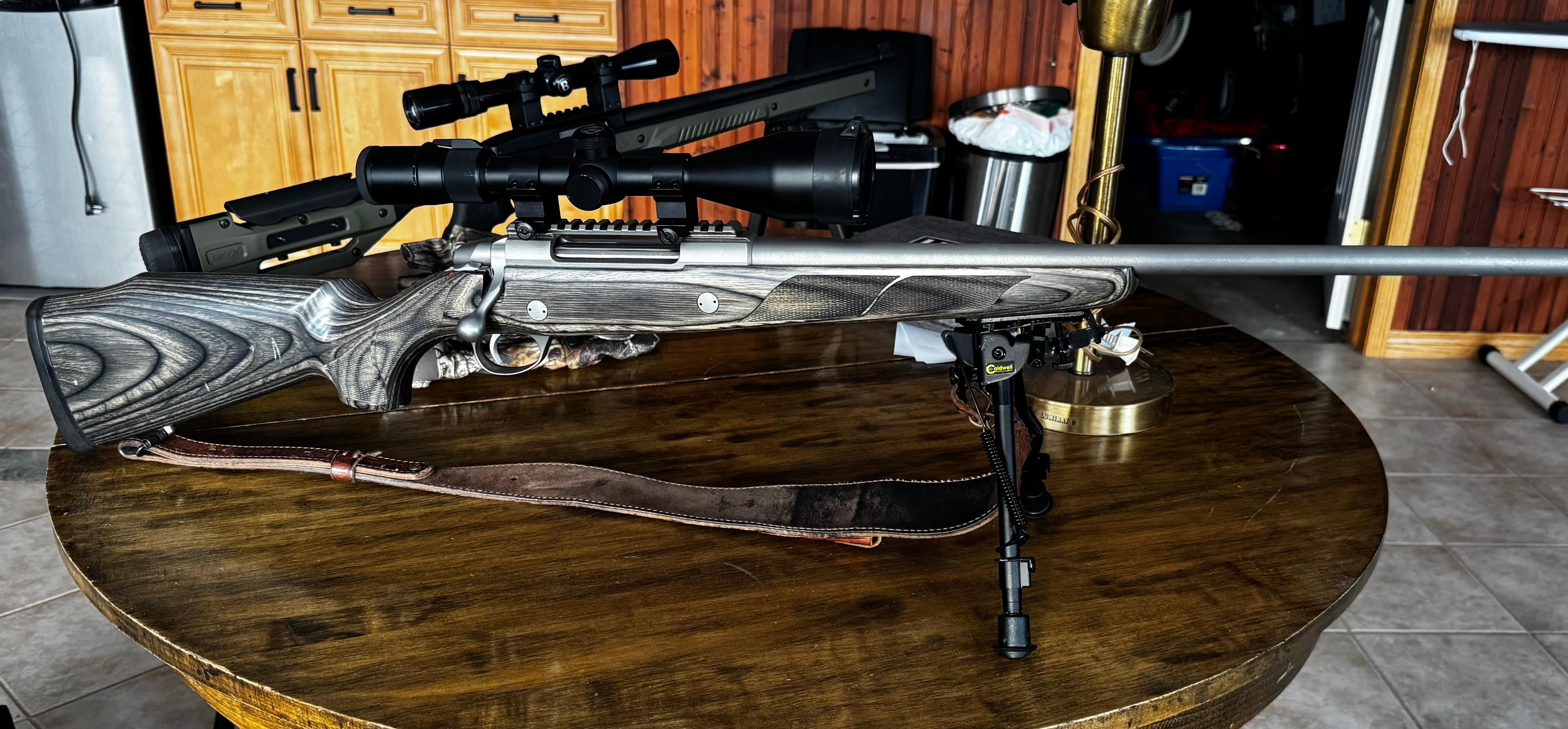 Photo of Sako 75 Hunter Laminated Stainless Bolt Action Rifle 7mm Remington Magnum Stainless Barrel Laminated Wood Stock