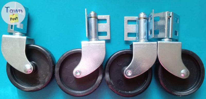 Photo of New set of 4 corner angle mount caster wheels