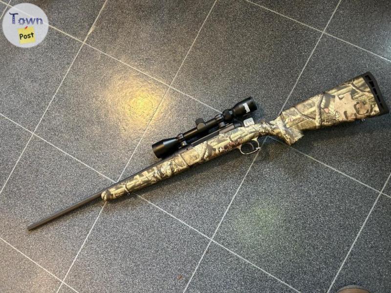 Photo of Savage Bolt Action 22-250 with Scope New