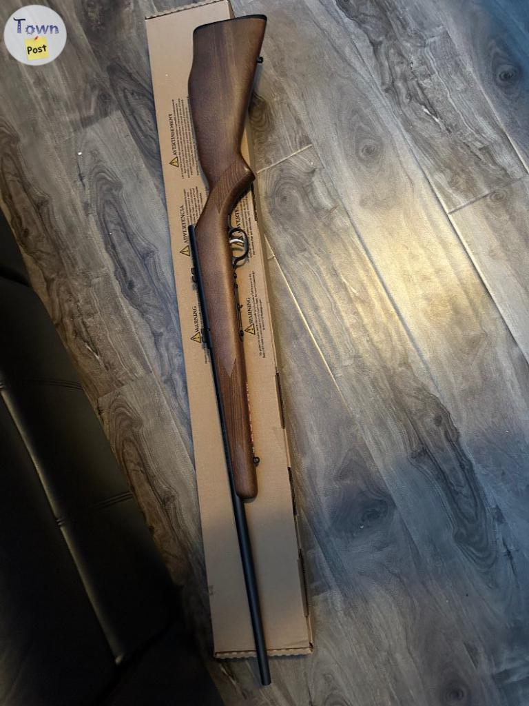 Photo of Savage  Rifle 22LR Bolt Action With Weaver 3x9x40 Rifle Scope