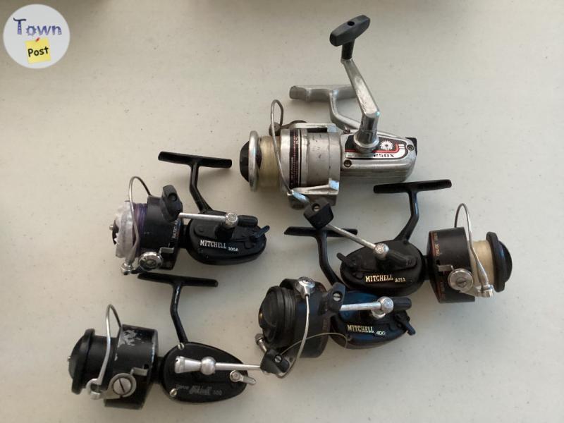 Photo of MITCHELL & DAIWA FISHING REELS