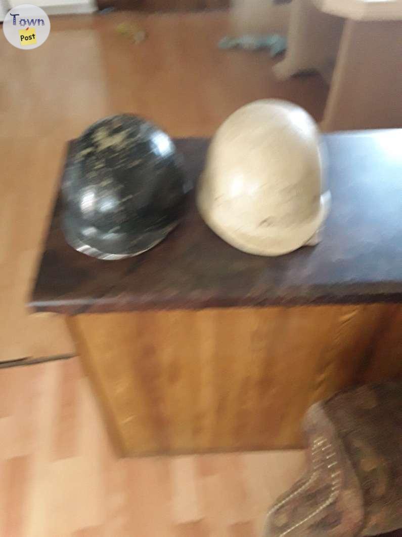 Photo of Iran  an  Iraq army helmets from war time