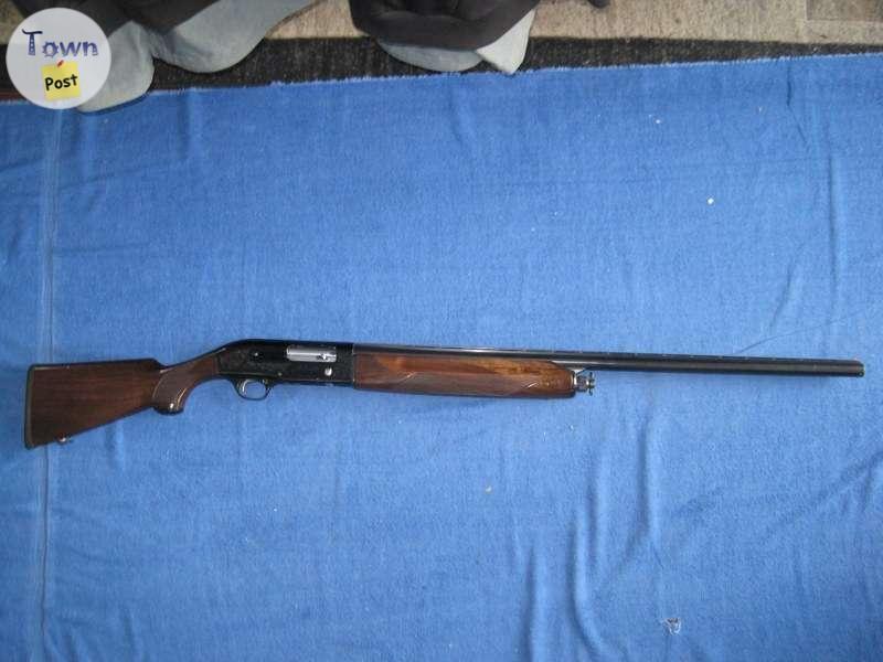 Photo of Beretta Model 301 Semi auto 12GA