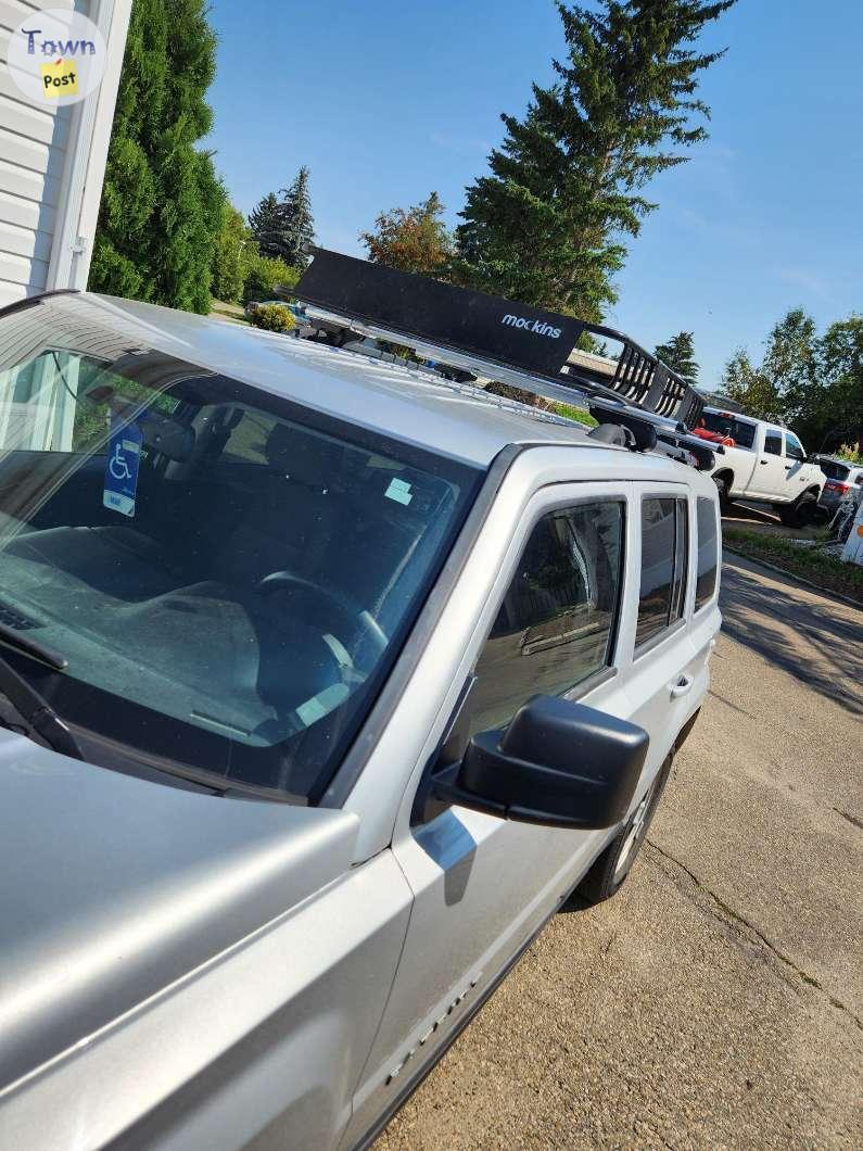 Photo of car carrier with racks