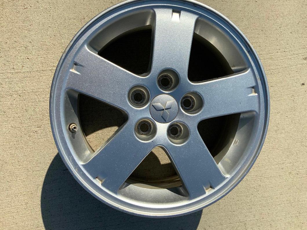 Photo of 3-16 inch factory Mitsubishi rims with sensors. Like new condition 